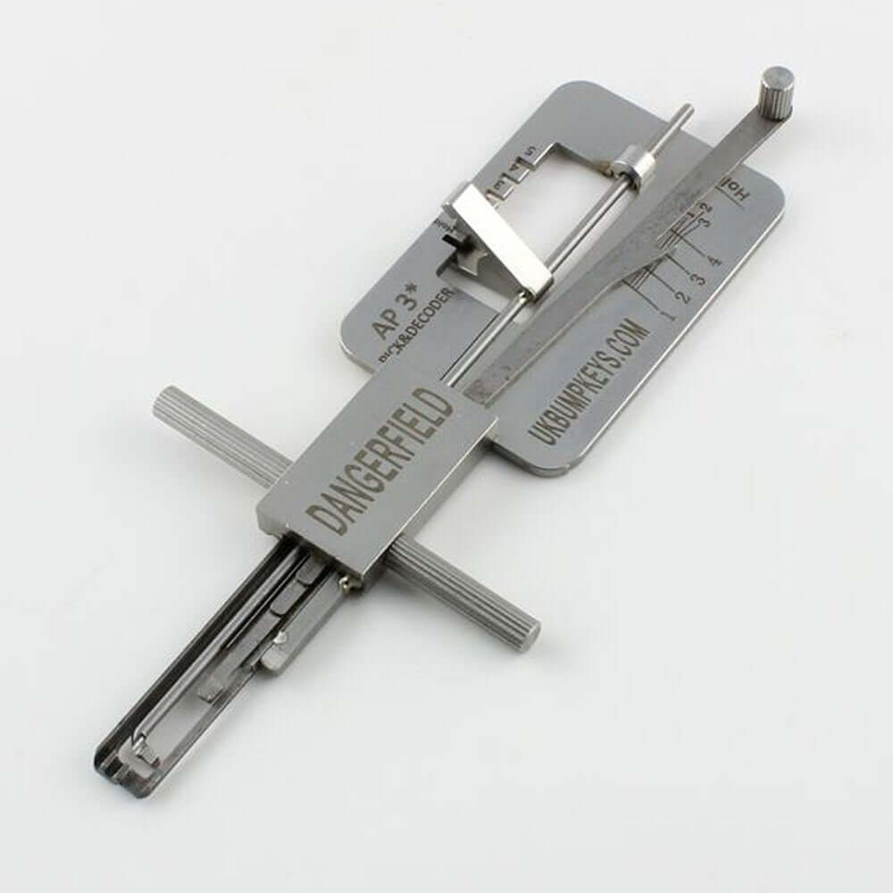 Metal APECS Lock Picking tool with engraved text on a white background