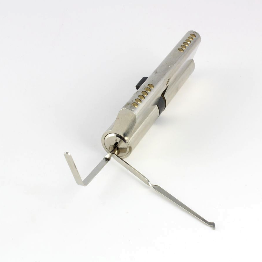 Bogota lock-picking tools in a lock on a white background