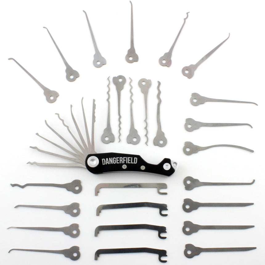 Dangerfield Skeleton Multitool with 26 Piece Lock Pick Expansion Set laid out in an array, showcasing EDC tools and rakes.