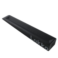 A black textured Lokko wedge with white brand lettering, photographed on a clean white background.
