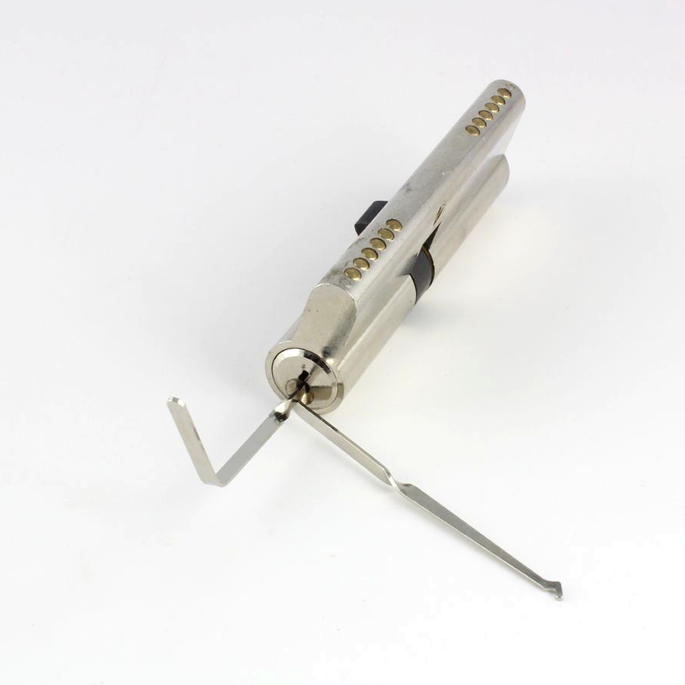 Bogota lock-picking tools in a lock on a white background