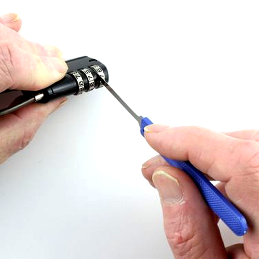 Person decoding a combination lock with a lock picking bypass tool on a white background
