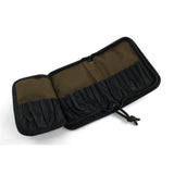 Dangerfield Jackal lock pick case open flat and empty, both inner faces visible with the tan backing and black pocket fabric