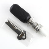 Lokko 7-pin tubular lock pick with textured grip handle beside its numbered decoder key on a dark background