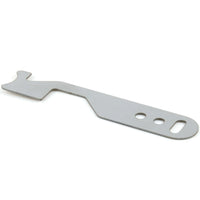Close view of the Lokko Pocket Shove-It hooked tip cut into flat stainless steel for driving a spring latch