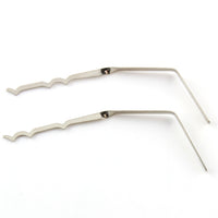 A pair of silver-colored metal lock rakes with a fine gauge design, displayed against a white background.