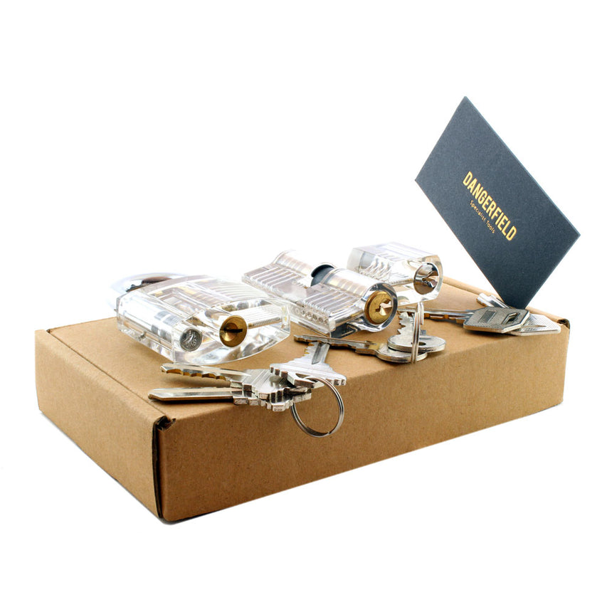 Dangerfield Practice Lock Box with three practice locks and keys, ideal for improving lock-picking skills and security knowledge.